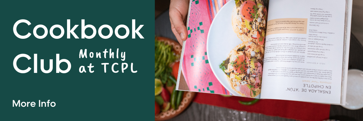 Cookbook Club - monthly at TCPL - Image of a person holding a cookbook open on their lap