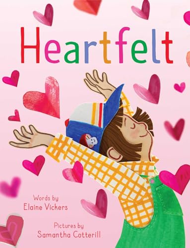 Image for "Heartfelt" - a pink background with an illustration giving the effect of being out of paper, a young girl dancing with her hands up wearing a blue baseball cap with a mushroom, a yellow stripped collared shirt and green overalls - red paper looking hearts are all around her