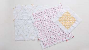 Sashiko Sewing - Japanese Embroidery of 3 cloths with pink and yellow embroidery