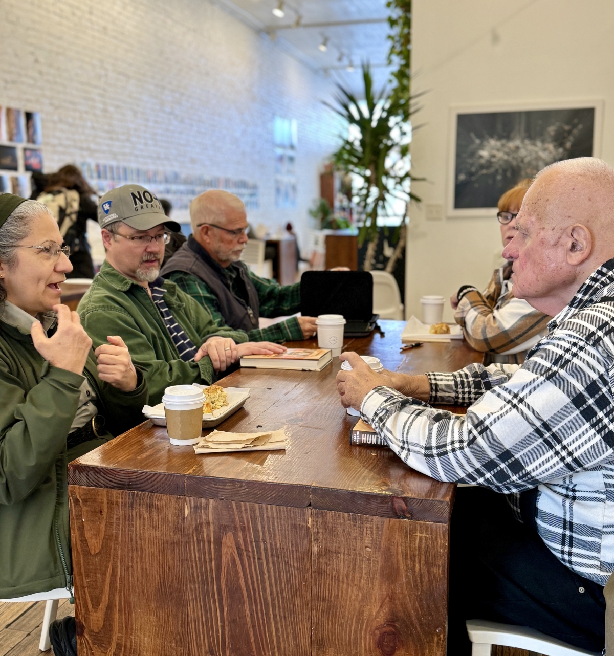 Learners Book Club at Harden Coffee - book club members enjoying coffee and discussing a book