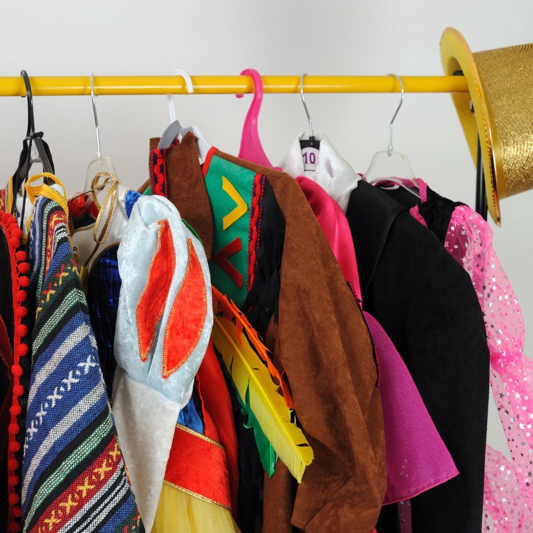 Dress up clothes hanging on a rack