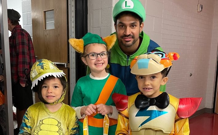 Kids and an Adult Dressed Up for Halloween -October Events Feature