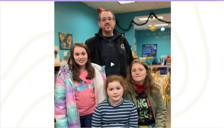 Joshua and Jennifer and family in the Children's Room